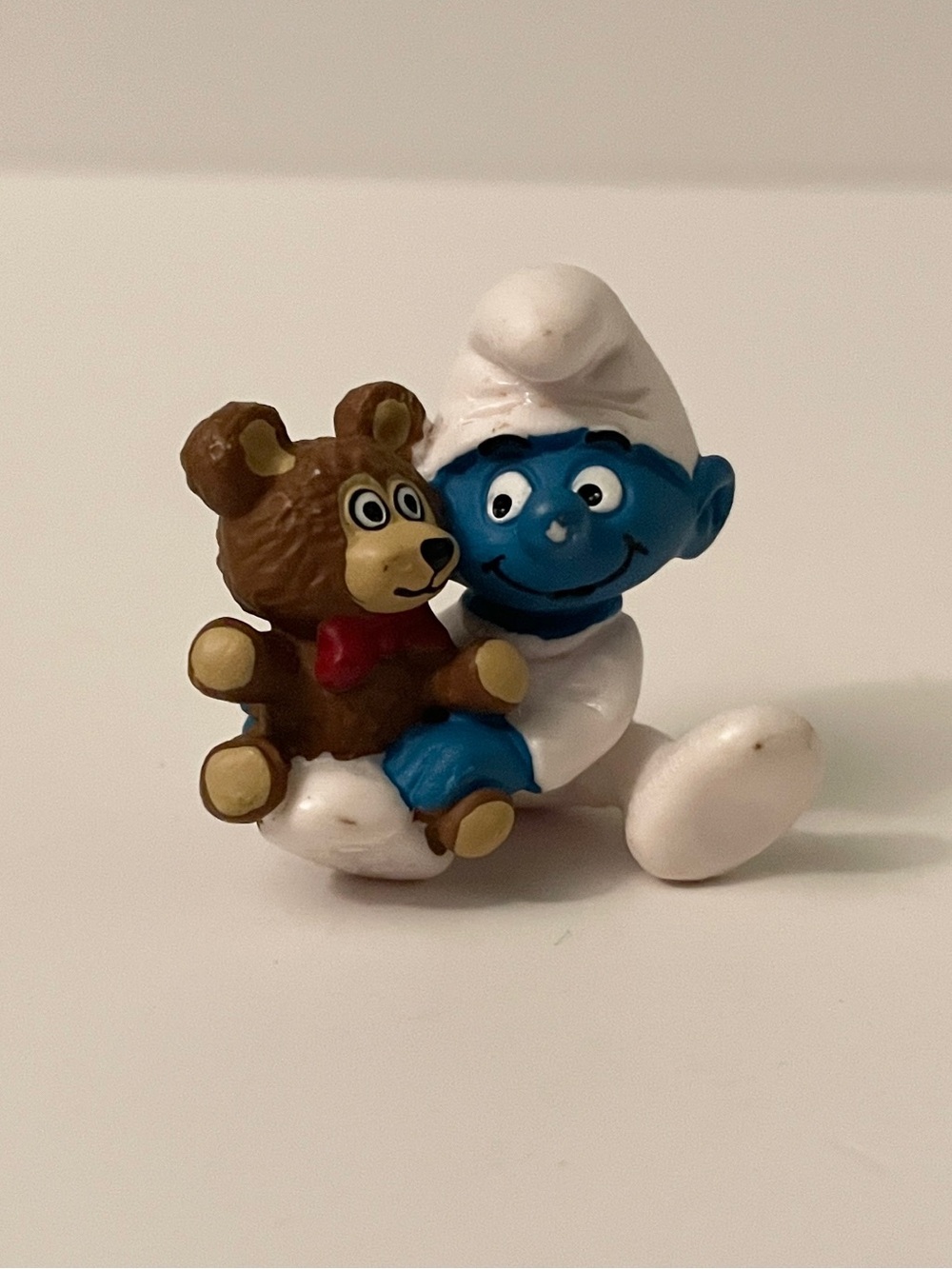 Vintage 1984 Peyo Schleich Baby Smurf with Teddy Bear PVC Figure
